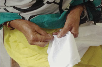 A woman working on cloth